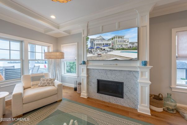 Fireplace, Interior, Recessed Lighting, Water, Wood Texture Flooring