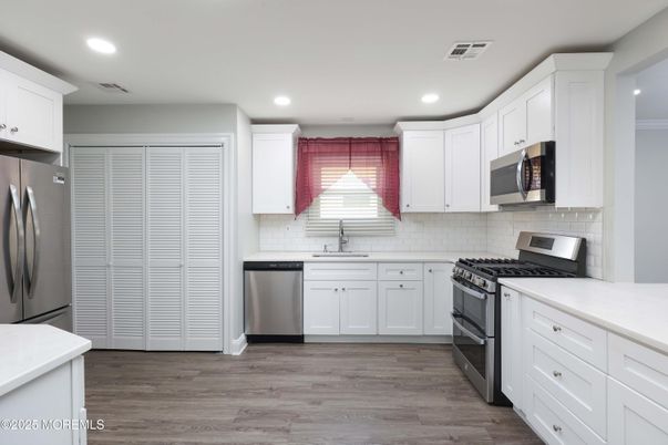 Interior, Kitchen, Recessed Lighting, Stainless Steel Appliances, Wood Texture Flooring