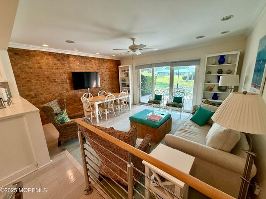 Dining room, Interior, Living room, Recessed Lighting, Stone Walls, Wood Texture Flooring