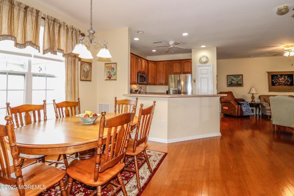 Dining room, Interior, Kitchen, Pendant Lights, Recessed Lighting, Stainless Steel Appliances, Wood Texture Flooring