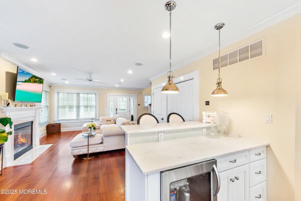 Fireplace, Interior, Kitchen, Living room, Pendant Lights, Recessed Lighting, Wood Texture Flooring