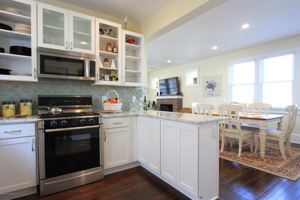 Dining room, Interior, Kitchen, Recessed Lighting, Stainless Steel Appliances, Wood Texture Flooring