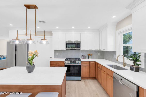 Interior, Kitchen, Pendant Lights, Recessed Lighting, Stainless Steel Appliances, Wood Texture Flooring