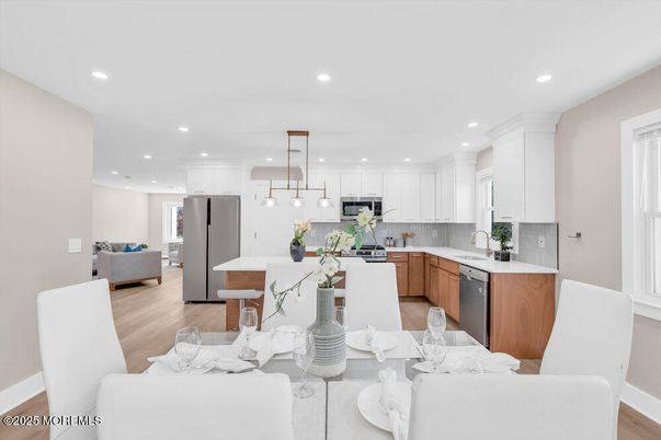 Dining room, Interior, Kitchen, Living room, Pendant Lights, Recessed Lighting, Stainless Steel Appliances, Wood Texture Flooring