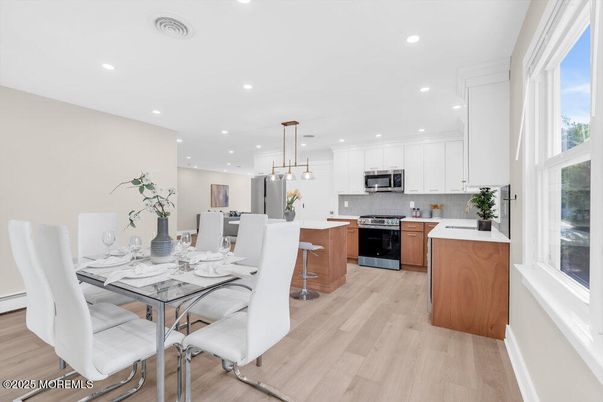 Dining room, Interior, Kitchen, Pendant Lights, Recessed Lighting, Stainless Steel Appliances, Wood Texture Flooring