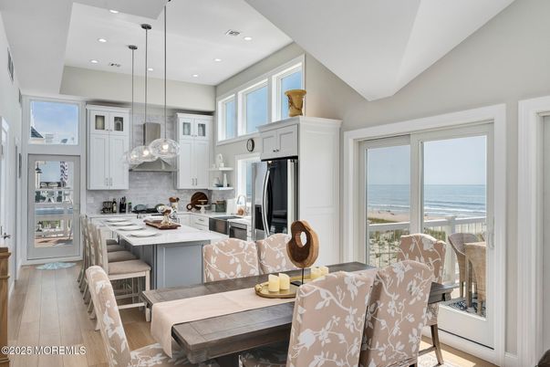 Dining room, Interior, Kitchen, Pendant Lights, Recessed Lighting, Stainless Steel Appliances, Water, Wood Texture Flooring