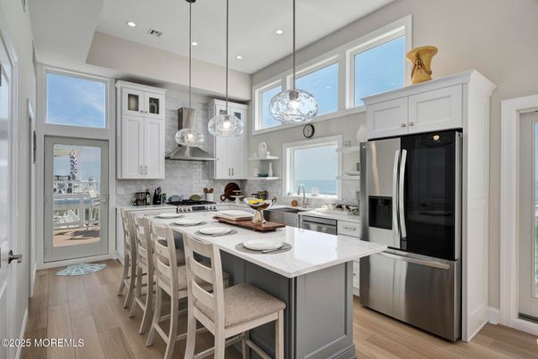 Interior, Kitchen, Pendant Lights, Recessed Lighting, Stainless Steel Appliances, Water, Wood Texture Flooring