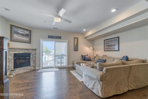Fireplace, Interior, Living room, Recessed Lighting, Wood Texture Flooring