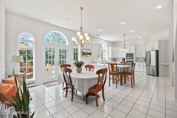 Chandelier, Dining room, Interior, Kitchen, Pendant Lights, Recessed Lighting, Stainless Steel Appliances