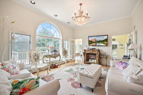 Chandelier, Fireplace, Interior, Living room, Recessed Lighting, Wood Texture Flooring