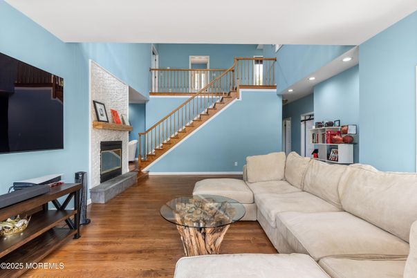 Fireplace, Interior, Living room, Recessed Lighting, Wood Texture Flooring