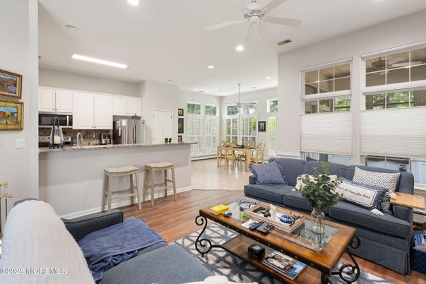 Dining room, Interior, Kitchen, Living room, Recessed Lighting, Stainless Steel Appliances, Wood Texture Flooring