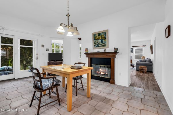 Dining room, Fireplace, Interior, Pendant Lights, Wood Texture Flooring