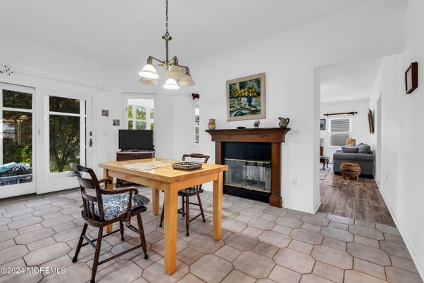 Dining room, Fireplace, Interior, Pendant Lights, Wood Texture Flooring