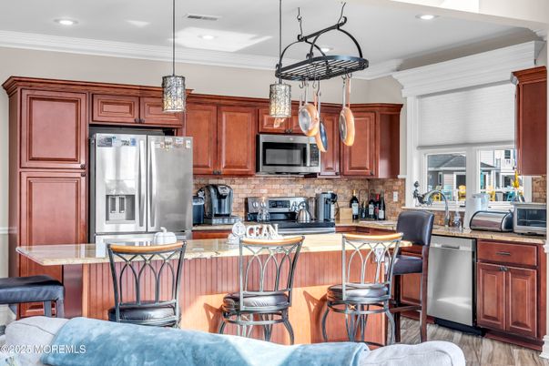 Interior, Kitchen, Pendant Lights, Recessed Lighting, Stainless Steel Appliances, Wood Texture Flooring