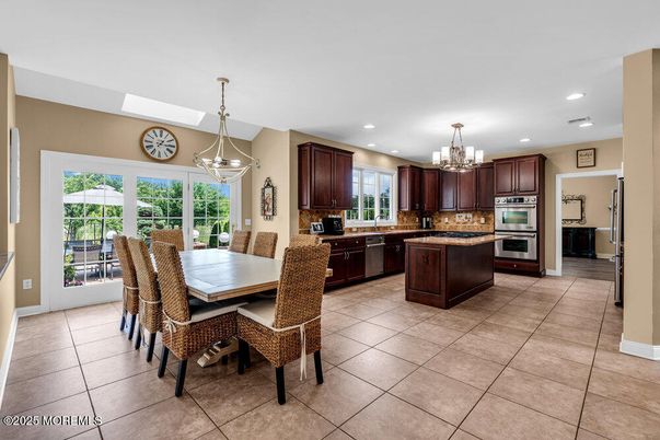 Chandelier, Dining room, Interior, Kitchen, Pendant Lights, Recessed Lighting, Stainless Steel Appliances