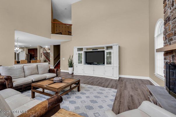 Dining room, Fireplace, Interior, Living room, Pendant Lights, Recessed Lighting, Stone Walls, Wood Texture Flooring