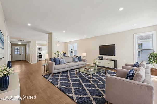 Interior, Living room, Pendant Lights, Recessed Lighting, Stainless Steel Appliances, Wood Texture Flooring