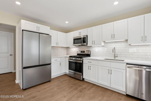 Interior, Kitchen, Recessed Lighting, Stainless Steel Appliances, Wood Texture Flooring