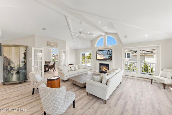 Dining room, Fireplace, Interior, Living room, Recessed Lighting, Wood Texture Flooring
