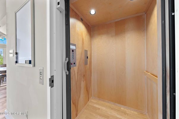 Elevator, Interior, Recessed Lighting, Wooden Ceilings, Wood Texture Flooring, Wooden Walls