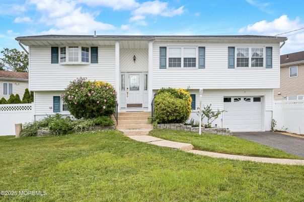 Attached, Exterior, Facade, Raised Ranch