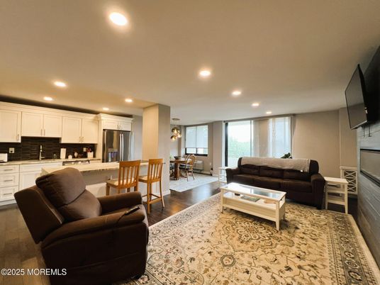 Dining room, Interior, Kitchen, Living room, Pendant Lights, Recessed Lighting, Stainless Steel Appliances, Wood Texture Flooring