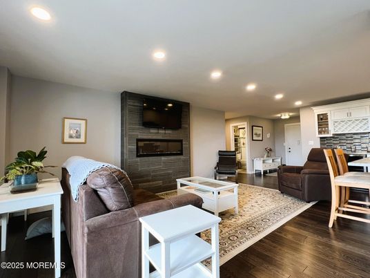 Fireplace, Interior, Living room, Recessed Lighting, Wood Texture Flooring