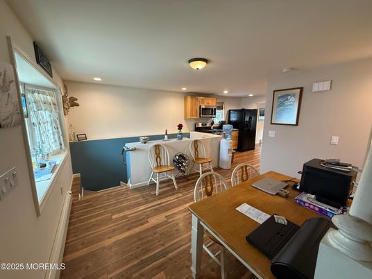 Dining room, Interior, Kitchen, Recessed Lighting, Stainless Steel Appliances, Wood Texture Flooring