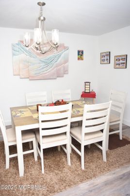 Chandelier, Dining room, Interior, Wood Texture Flooring