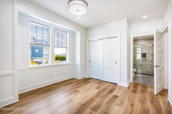 Bathroom, Empty room, Glass Shower, Interior, Recessed Lighting, Wood Texture Flooring