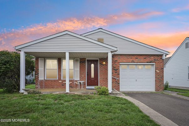 Attached, Exterior, Facade, Brick Facade, American Craftsman