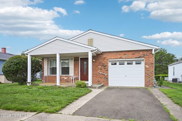 Attached, Exterior, Facade, Brick Facade, Brick Traditional