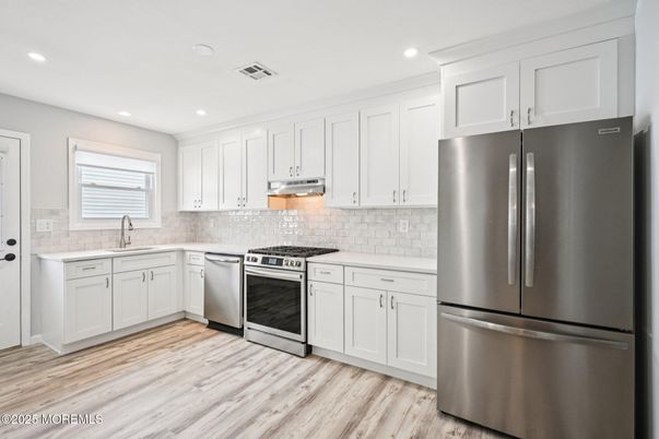 Interior, Kitchen, Recessed Lighting, Stainless Steel Appliances, Wood Texture Flooring