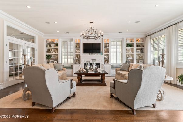 Chandelier, Fireplace, Interior, Living room, Recessed Lighting, Wood Texture Flooring