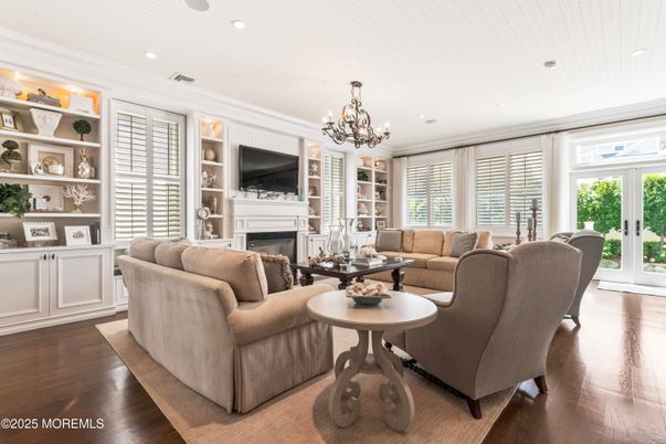 Chandelier, Fireplace, Interior, Living room, Recessed Lighting, Wood Texture Flooring