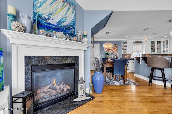 Dining room, Fireplace, Interior, Pendant Lights, Recessed Lighting, Wood Texture Flooring