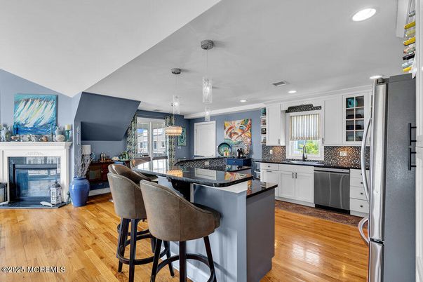 Fireplace, Interior, Kitchen, Pendant Lights, Recessed Lighting, Wood Texture Flooring
