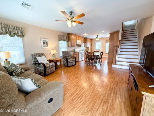 Dining room, Interior, Kitchen, Living room, Recessed Lighting, Stainless Steel Appliances, Wood Texture Flooring