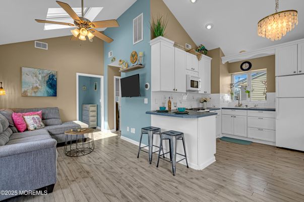 Chandelier, Interior, Kitchen, Living room, Recessed Lighting, Wood Texture Flooring