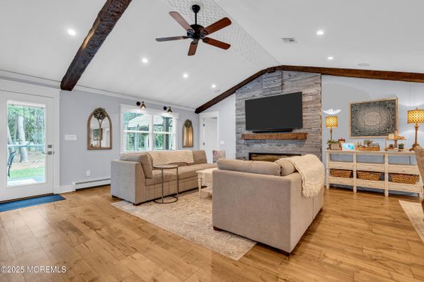 Fireplace, Interior, Living room, Recessed Lighting, Stone Walls, Wooden Beams, Wood Texture Flooring