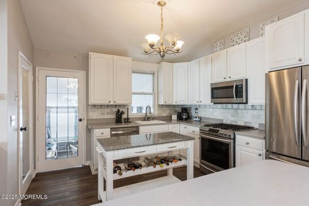 Chandelier, Interior, Kitchen, Stainless Steel Appliances, Wood Texture Flooring