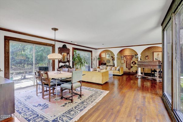 Dining room, Interior, Living room, Pendant Lights, Piano, Recessed Lighting, Wood Texture Flooring