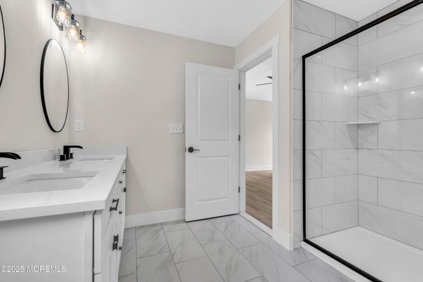 Bathroom, Dual Sink Vanities, Glass Shower, Interior, Marble, Marble Walls