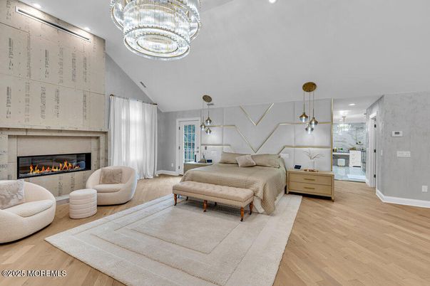 Bedroom, Fireplace, Interior, Pendant Lights, Recessed Lighting, Wood Texture Flooring