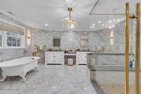 Bathroom, Chandelier, Dual Sink Vanities, Free Standing Baths, Glass Shower, Interior, Marble, Marble Walls, Recessed Lighting