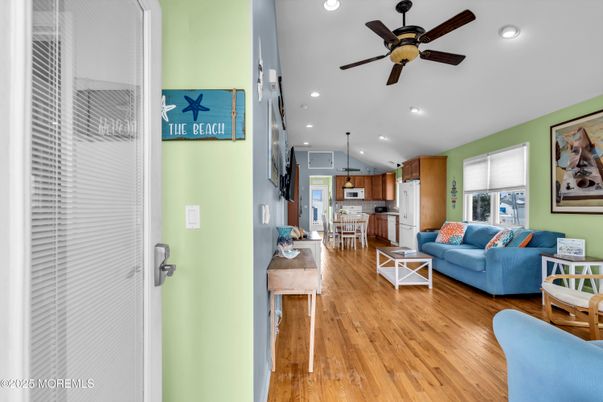 Dining room, Interior, Kitchen, Living room, Recessed Lighting, Stainless Steel Appliances, Wood Texture Flooring