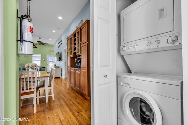Dining room, Interior, Recessed Lighting, Utility Closets, Washer, Wood Texture Flooring