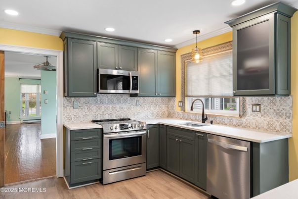 Interior, Kitchen, Pendant Lights, Recessed Lighting, Stainless Steel Appliances, Wood Texture Flooring
