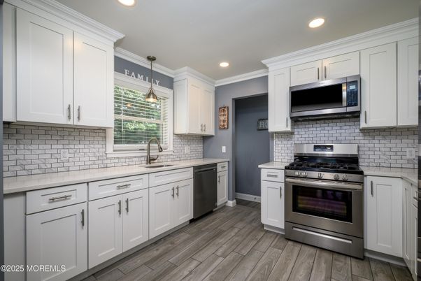 Interior, Kitchen, Pendant Lights, Recessed Lighting, Stainless Steel Appliances, Wood Texture Flooring